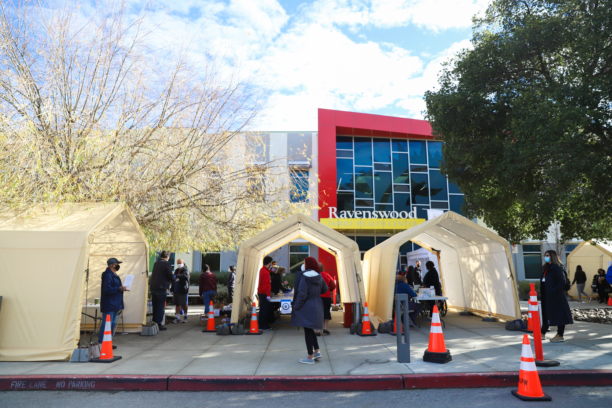 Patients and workers at a COVID-19 vaccination site at Ravenswood Family Health Center in East Palo Alto on Jan. 30, 2021. Photo by Magali Gauthier.